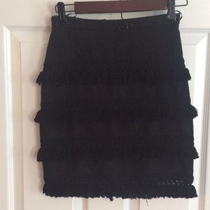Black mini skirt with fringe overlay